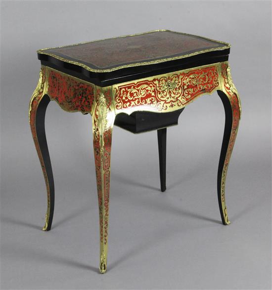 A 19th century French red boulle work and ebonised poudreuse, W.2ft 1in. D.1ft 7in. H.2ft 6in.